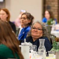 people seated and listening photo 2